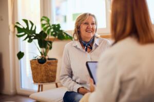A smiling female patient during a consultation